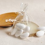 Podziękowania dla gości na Chrzest– migdały w woreczku z przywieszką gołębia