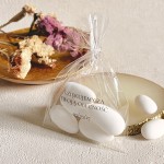 Podziękowania dla gości na ślub – migdały w woreczku z personalizowaną naklejką 2