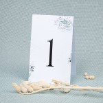 Numery stołów weselnych z motywem niebieskich listeczków - Green Calendar