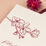 Zaproszenia ślubne z delikatnym motywem kwiatów orchidei na papierze ecru - Orchid Ecru